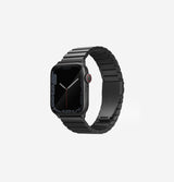 A black stainless steel Apple watch strap. 789